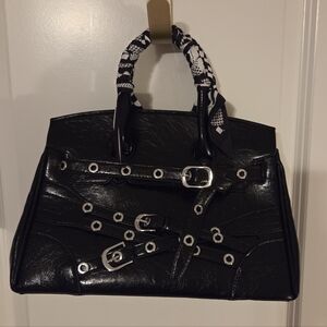Stylish Black Handbag with Silver Accents